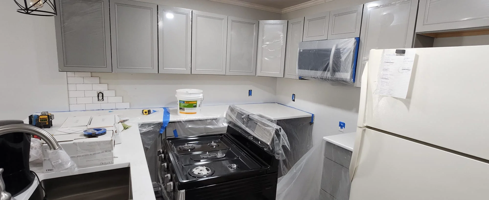 Kitchen Remodel: New Cabinets, Tile Walls, and Paint Job