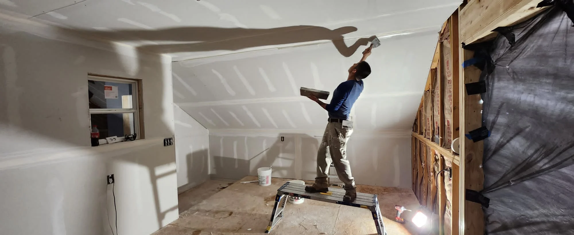 Attic Room Conversion: Insulation, Sheetrock, Flooring, and Paint