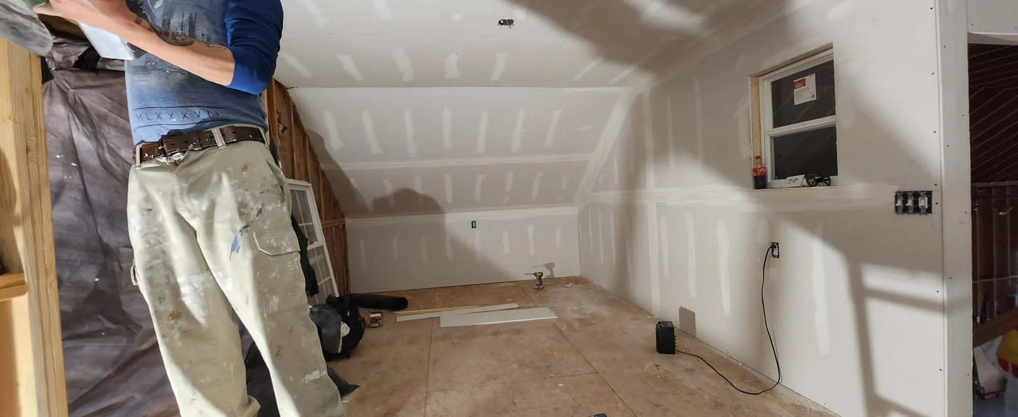 Attic Room Conversion: Insulation, Sheetrock, Flooring, and Paint